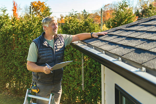 Professional Roof Replacement technician working in Cambridge, OH